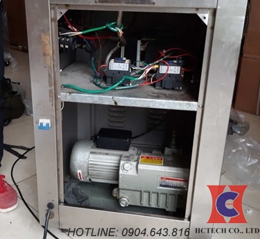 Thay dầu cho máy hút chân không